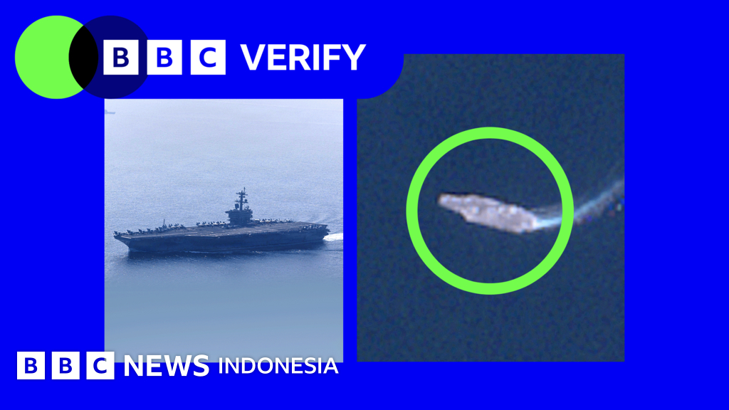 Sebuah kapal induk Angkatan Laut Amerika Serikat berlayar di perairan internasional. Pengerahan kapal induk kedua ke Timur Tengah menegaskan peningkatan kehadiran militer AS di dekat Iran.