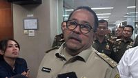 Wakil Gubernur DKI Jakarta Rano Karno saat menjelaskan kebijakan efisiensi anggaran yang berimbas pada penundaan proyek pembangunan markas Satpol PP.
