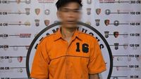 Petugas kepolisian mengamankan area kejadian perkara di Belawan setelah insiden penyerangan dengan senjata tajam.