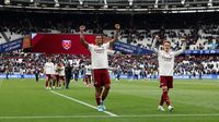 Gelandang Arsenal merayakan gol krusial yang dicetak ke gawang West Ham United, memperketat persaingan di puncak klasemen Liga Inggris pada 10 Mei lalu.