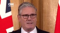 Perdana Menteri Inggris Keir Starmer dalam sebuah konferensi pers di London. Klaim mengenai pujiannya terhadap kesepakatan damai AS-Iran era Trump pada Juni 2020 membutuhkan verifikasi faktual yang mendalam.