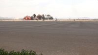 Asap mengepul setelah serangan udara di Sanaa, Yaman, yang diklaim Houthi menargetkan Bandara Internasional Sanaa, memicu balasan rudal ke Arab Saudi.