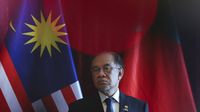 Perdana Menteri Malaysia Anwar Ibrahim saat menyampaikan pernyataan terkait isu keuangan negara dan transparansi.