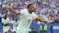 Tim nasional Prancis merayakan kemenangan di Piala Dunia, menatap edisi 2026 dengan ambisi tinggi setelah prediksi superkomputer menempatkan mereka sebagai favorit juara.