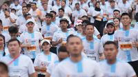 Ribuan peserta memadati garis start Riau Bhayangkara Run 2026 di Pekanbaru, menggerakkan roda ekonomi lokal melalui gelaran olahraga massal.