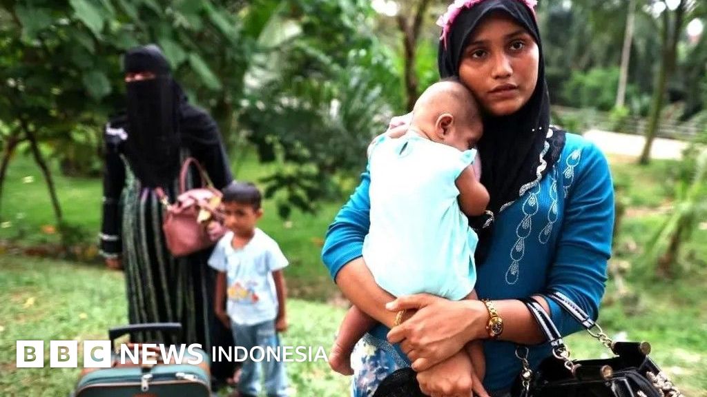 Seorang anak pengungsi Rohingya memandang kosong di kamp penampungan, mencerminkan ketidakpastian masa depan di tengah penolakan yang semakin meningkat di Malaysia.