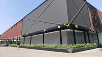 Petugas Satpol PP Kota Bandung melakukan penyegelan sebuah videotron di SixNine Padel Cihapit, menyusul dugaan kuat penebangan 10 pohon tanpa izin yang melanggar peraturan lingkungan kota.