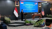 Delegasi pemerintah Indonesia dan Malaysia dalam momen penandatanganan MoU kerja sama strategis pengembangan perdesaan, berfokus pada penguatan ekonomi dan teknologi digital.