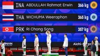 Rahmat Erwin Abdullah, atlet angkat besi kebanggaan Indonesia, disambut hangat setelah meraih medali emas sesuai target yang ditetapkan.
