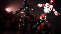 Robot humanoid beraksi dalam duel sengit di arena Avatar Robot Combat (ARC), menandai dimulainya era baru olahraga yang dikendalikan manusia.